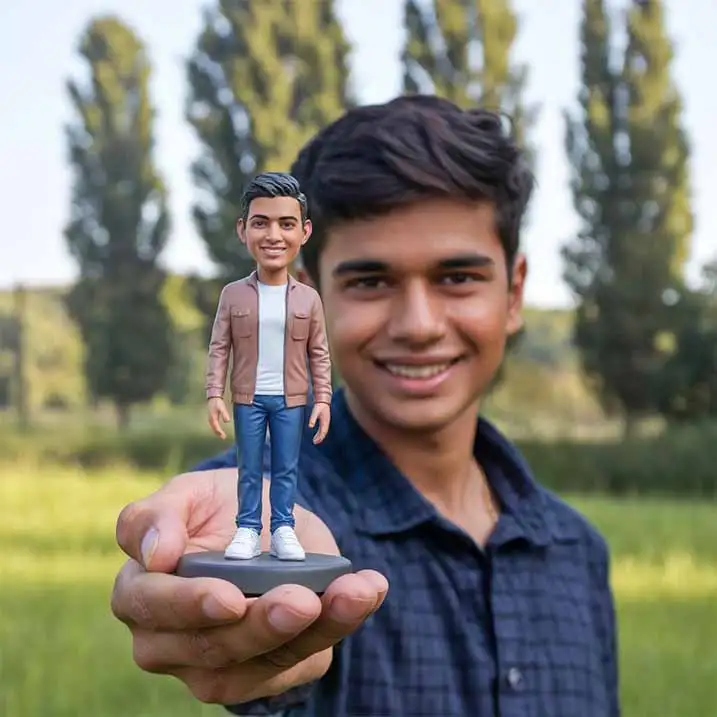 A boy holding his own mini replica statute figurine doll in his hand